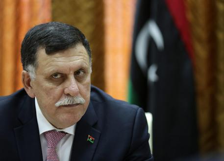 Libya's unity government's Prime Minister-designate Fayez al-Sarraj chairs a meeting of the presidential council with Tripoli municipal council in Tripoli, Libya, 31 March 2016. ansa/STR
