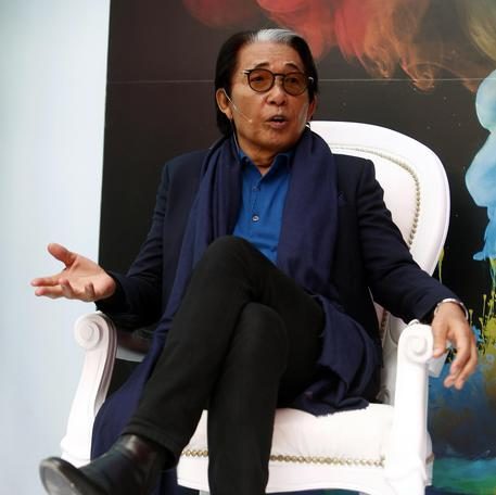 epa07741147 Japanese designer Kenzo Takada speaks during a press conference at Colombiamoda 2019 in Medellin, Colombia, 25 July 2019. Kenzo presented two new perfumes with Avon.  EPA/LUIS EDUARDO NORIEGA