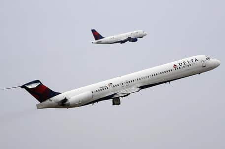 epa08124931 (FILE) - A Delta Air Lines McDonnell Douglas MD-88 tail number N982DL takes off with another Delta flight taking off in the background as it heads to Grand Rapids, Michigan from Hartsfield-Jackson Atlanta International Airport in Atlanta, Georgia, USA, 27 January 2019 (reissued 13 January 2020). Delta Airlines is to release their 4th quarter 2019 results on 13 January 2020.  EPA/MATT CAMPBELL