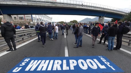 The workers of the Whirlpool block the motorway at the plant in via Argine, Naples, Italy, 28 October 2020. The protest is part of the initiatives to fight against the closure of the plant scheduled for next Saturday, 31 October. The workers are making 8 hours of strike, proclaimed by trade union organizations, to urge the government to a decisive intervention on the multinational to prevent the cessation of productive activities.   ANSA / Cesare Abbate