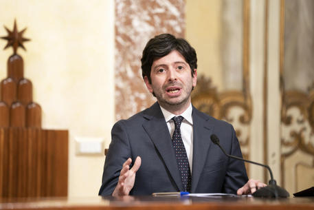 A handout photo made available by the Chigi Palace Press Office shows Italian Minister of Health, Roberto Speranza, while attends a press conference during a break of the Cabinet for the 