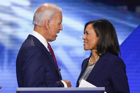 (FILES) In this file photo taken on September 12, 2019 Former Vice President Joe Biden and Senator Kamala Harris speak on in Houston, Texas, after the third Democratic primary debate of the 2020 presidential campaign season hosted by ABC News in partnership with Univision at Texas Southern University in Houston, Texas. - This week the eyes of US voters turn to Joe Biden, Kamala Harris and the Democratic convention -- unless they swivel first to Republican distracter-in-chief Donald Trump. (Photo by Robyn Beck / AFP)