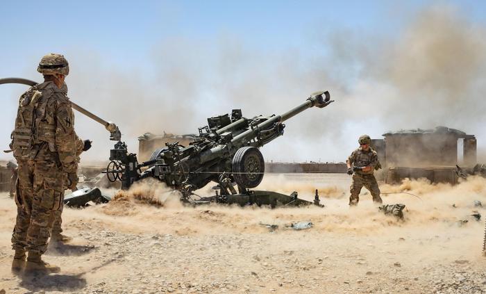 epa07832227 A handout photo made available by the US Army shows Soldiers from the 1-118th Field Artillery Regiment of the 48th Infantry Brigade Combat Team firing an M777 Howitzer during a fire mission in Helmand Province, southern Afghanistan, 10 June 2019 (issued 10 September 2019). Media reports quoting US officials state that the US military is likely to ramp up its operations in Afghanistan following Washington's suspension of peace talks with the Taliban on 09 September 2019, after the insurgent group kept carrying out high profile attacks in the country, including one that recently killed a US soldier. The Taliban on 10 September 2019, pledged to continue fighting against US forces in Afghanistan after President Trump declared peace talks with the group as 'dead', media added.  EPA/SGT. JORDAN TRENT/US ARMY HANDOUT  HANDOUT EDITORIAL USE ONLY/NO SALES