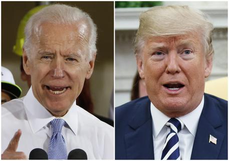 FILE - In this combination of file photos, former Vice President Joe Biden speaks in Collier, Pa., on March 6, 2018, and President Donald Trump speaks in the Oval Office of the White House in Washington on March 20, 2018. Biden regrets saying hed beat the hell out of Trump if they were in high school for how he treats women. In a Pod Save America interview released Wednesday, March 28, 2018, the Democrat said I shouldnt have said what I said. (ANSA/AP Photo/File) [CopyrightNotice: Copyright 2018 The Associated Press. All rights reserved.]
