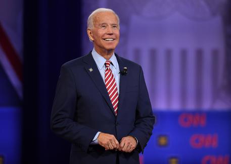 (FILES) In this file photo Democratic presidential hopeful former US Vice President Joe Biden gestures as he speaks during a town hall devoted to LGBTQ issues hosted by CNN and the Human rights Campaign Foundation at The Novo in Los Angeles on October 10, 2019. - US Senator Bernie Sanders has suspended his presidential campaign, his team said on April 8, 2020, clearing the way for rival Joe Biden to become the Democratic nominee to challenge Republican incumbent Donald Trump in November. Sanders, a 78-year-old leftist who challenged Hillary Clinton for the nomination in 2016, was holding a staff conference call on Wednesday when he 