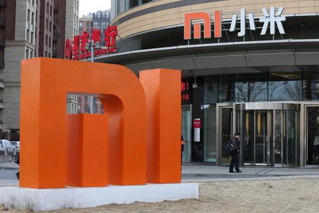 epa04615527 A large logo of Chinese mobile phone product manufacturer Xiaomi at Xiaomi's headquarters in Beijing, China, 12 February 2015. Chinese mobile phone maker Xiaomi, is the third-largest producer of smartphones in the world behind Apple and Samsung. The estimated value of the company is some 50 billion US dollars. Xiaomi may join the ranks of other major Chinese enterprises such as Alibaba and file for an IPO in 2015.  EPA/WU HONG