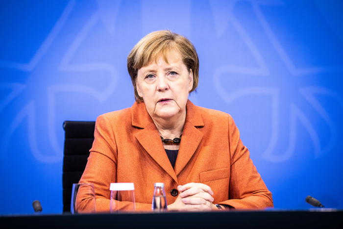 epa08881023 German Chancellor Angela Merkel during a press conference after a video conference with German State Premiers about increased anti-coronavirus measures to be implemented on upcoming 16 December, in Berlin, Germany, 13 December 2020.  EPA/RAINER KEUENHOF / POOL