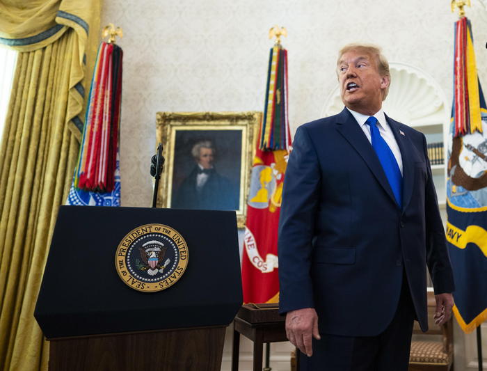 epa08868804 US President Donald J. Trump speaks after he presented the Presidential Medal of Freedom to former wrestler Dan Gable in the Oval Office of the White House, Washington, DC, USA, 07 December 2020. EPA/Doug Mills / POOL