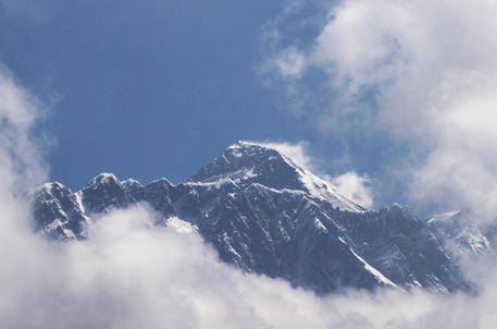 epa08869819 (FILE) - World's tallest peak, Mount Everest, as seen from Namche Bazar, Solukhumbu district, Nepal 27 May 2019 (reissued 08 December 2020). Nepal and China have agreed on a new official height for Mount Everest. The height of the world's highest peak is now given as 8848.86 meters. In the past two years, China and Nepal have sent teams to take measurements at the summit in the border area. EPA/NARENDRA SHRESTHA *** Local Caption *** 55949778