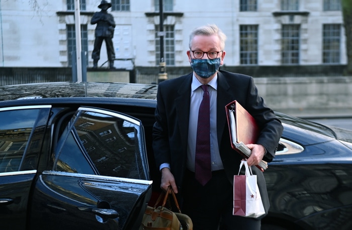 epa08883212 British Chancellor of the Duchy of Lancaster Michael Gove arrives at the Cabinet Office in London, Britain, 14 December 2020. The UK and EU governments have said they want 'to go the extra mile' in a new push to reach an agreement on post-Brexit trade.  EPA/ANDY RAIN