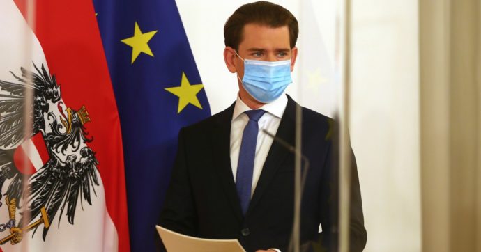 Austrian Chancellor Sebastian Kurz wearing a face mask to protect against coronavirus, prior to making an address, at the federal chancellery in Vienna, Austria, Saturday, Nov. 14, 2020. The Austrian government has moved to restrict freedom of movement for people, in an effort to slow the onset of the COVID-19 coronavirus. (AP Photo/Ronald Zak)