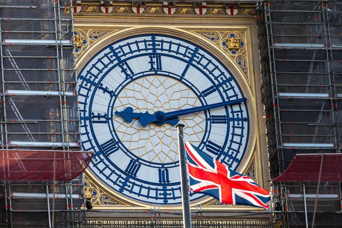 epa08863203 A Union Jack flag waves next to the clock face of Big Ben in Westminster, London, Britain, 05 December 2020. British and EU negotiators have paused Brexit talks because they say significant divergences remain and the conditions for a deal between the two sides have not been met.  EPA/VICKIE FLORES