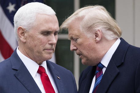 epa08931300 (FILE) - US President Donald J. Trump (R) turns over the podium to US Vice President Mike Pence (L) during a news conference in the Rose Garden of the White House in Washington, DC, USA, 04 January 2019 (reissued 11 January 2021). According to reports on 11 January 2021, US House Speaker Nancy Pelosi urged US Vice President Mike Pence to oust US President Trump by invoking the 25th amendment, or said the Democrats would move forward with an impeachment.  EPA/MICHAEL REYNOLDS *** Local Caption *** 54874631