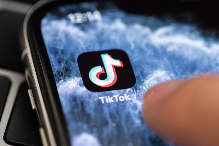 epa08578273 (FILE) - A close-up shows the video-sharing application 'TikTok' on a smart phone in Berlin, Germany, 07 July 2020 (reissued 01 August 2020). US President Trump said he intends to ban Chinese social media app TikTok.  EPA/HAYOUNG JEON