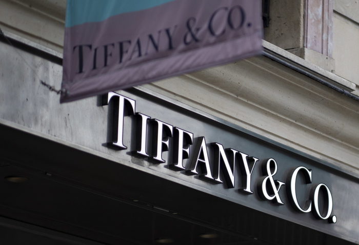 epa08924859 The Tiffany & Co logo seen outside their store on the Champs-Elysees in Paris, France, 07 January 2021. French luxury group LVMH, led by Bernard Arnaud, has acquired Tiffanys & Co for 12.8 million euro ($ 15.8 million).  EPA/IAN LANGSDON
