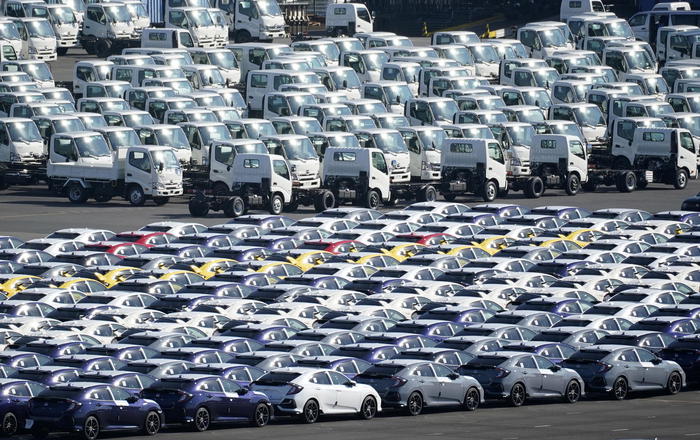 epa09013249 New vehicles for export are parked at a port in Yokohama, near Tokyo, Japan, 08 December 2020 (issued 15 February 2021). Based on official data released by the government, Japan's gross domestic product (GDP) for the October-December period grew by 12.7 percent on an annualized basis. In 2020 the Japanese economy marked its first decline since 2009.  EPA/FRANCK ROBICHON HANDOUT EDITORIAL USE ONLY/NO SALES