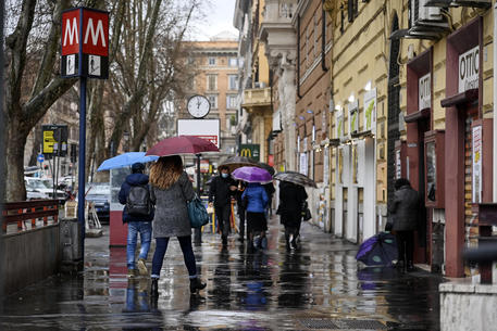 Few people for the city due to the rain in via Giulio Cesare in Rome, Italy, February 7, 2021. There were no criticalities due to the gatherings due to bad weather. ANSA/RICCARDO ANTIMIANI