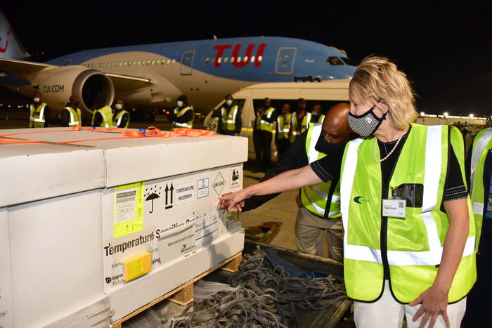 epa09017352 A handout photo made available by South Africa's Government Information Services (GCIS) shows the first delivery of the Johnson & Johnson COVID-19 vaccine arriving at the O R Tambo International Airport in Johannesburg, South Africa, 17 February 2021. The vaccine has been approved by South African Health Products Authority and is expected to only be given to health care workers. The consignment will be moved to a secure facility before being distributed overnight to the various vaccine centers in all provinces.  EPA/BABA JIYANE/GCIS HANDOUT  HANDOUT EDITORIAL USE ONLY/NO SALES