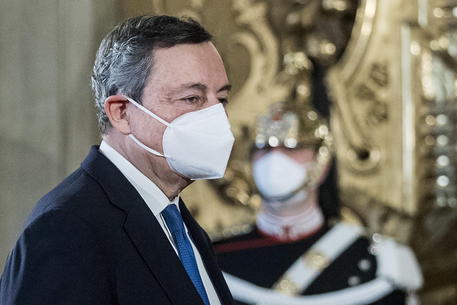 epa08984119 Former president of the European Central Bank (ECB) Mario Draghi moments before delivering a speech after a meeting with the Italian President Sergio Mattarella at the Quirinal Palace in Rome, Italy, 03 February 2021. 2021. President Mattarella has summoned Draghi for a meeting seeking for a 'high-profile' government. Mattarella, who said he was left with two choices, either calling snap elections or nominating a technical government, made the announcement after the ruling coalition failed to form a majority following Giuseppe Conte's resignation as prime minister.  EPA/ROBERTO MONALDO / POOL