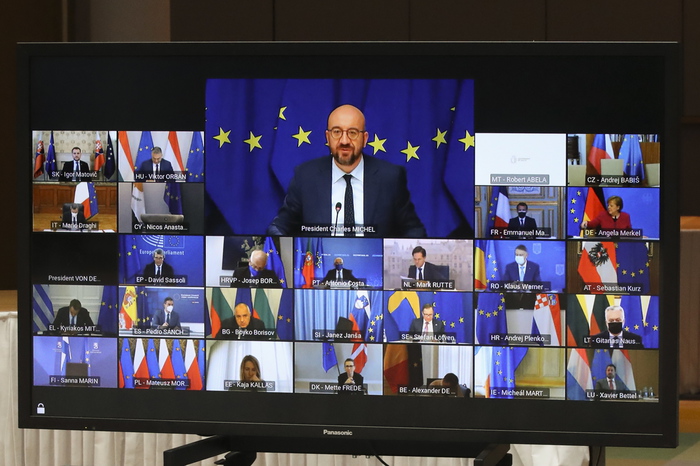 epa09096014 Screen shows European Council President Charles Michel as he holds a video conference with the leaders, during an EU summit in Brussels, Belgium, 25 March 2021.  EPA/YVES HERMAN / POOL