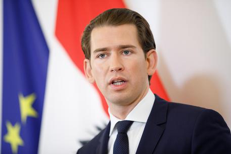 epa07577842 Austrian Chancellor Sebastian Kurz speaks at a press statement with the CEO of the Austrian oil and gas group OMV at the Federal Chancellery in Vienna, Austria, 17 May 2019. OMV CEO Seele announced that the Austrian energy group will create some 250 new jobs in Vienna.  EPA/FLORIAN WIESER