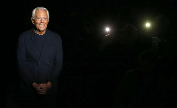 epa08125420 Italian fashion designer Giorgio Armani appears on the runway after the show by his label during the Milan Fashion Week Men's, in Milan, Italy, 13 January 2020. The Fall-Winter 2020/21 men's collections are presented at the Milano Moda Uomo from 10 to 14 January.  EPA/MATTEO BAZZI