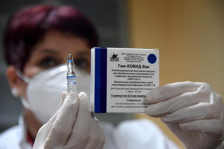 A nurse shows a dose of the Sputnik V vaccine against COVID-19 during a vaccination day to the medical staff of the Clinical Center of Montenegro in Podgorica, Montenegro, 23. February 2021. Montenegro began its mass vaccination against COVID-19 with elderly people and medical workers.  ANSA/BORIS PEJOVIC