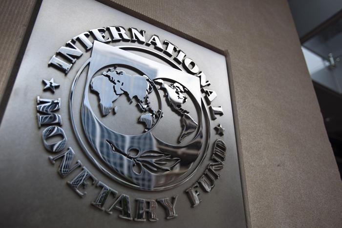 epa04824587 (FILE) A file photo dated 18 May 2011 showing the logo of the International Monetary Fund (IMF) at the entrance of the Headquarters of the IMF, also known as building HQ2, in Washington, DC, USA. Greece will not make the 1.6-billion-euro (1.8-billion-dollar) repayment due 30 June 2015 to the International Monetary Fund unless it strikes a deal in the coming hours with its creditors, Prime Minister Alexis Tsipras said in Athens as the deadline loomed. He implied that his left-wing government would resign if Greeks vote 'yes' in a planned 05 July referendum on a renegotiated bailout. The Greek vote is widely seen as deciding whether the near-bankrupt country stays in the eurozone. No country has left the currency bloc since its founding in 1999.  EPA/JIM LO SCALZO