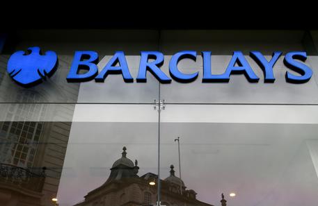 The sign on a branch of Barclays Bank in London, Tuesday, March 1, 2016. Barclays PLC has revealed plans to split itself into two as it reported a big fall in fourth-quarter profits.The bank said Tuesday its adjusted pretax profit, which includes one-off items like provisions to pay for mis-selling policies in the U.K., fell by more than a half to 247 million pounds ($344 million) from the year before. (ANSA/AP Photo/Kirsty Wigglesworth)