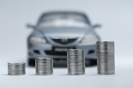 coin stacks in front of car