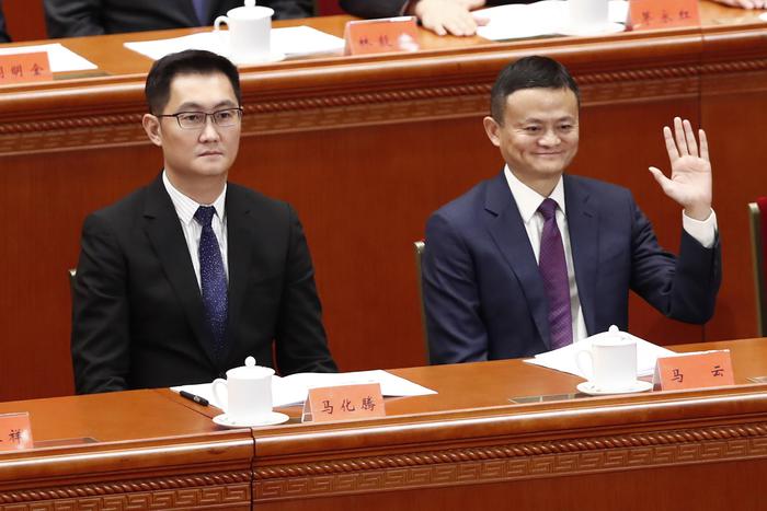 epa07237967 Tencent's Chief Executive Officer Pony Ma (also known as Ma Huateng, L) and Alibaba's Executive Chairman Jack Ma (R) attend a meeting held to celebrate the 40th anniversary of China's reform and opening up at the Great Hall of the People in Beijing, China, 18 December 2018.  EPA/WU HONG