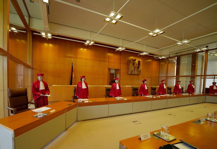 epa08444281 Members of the German Constitutional Court (Bundesverfassungsgericht, BVERfG) First Senate, (L-R) Henning Radtke, Yvonne Ott, Andreas L. Paulus, Gabriele Britz, Stephan Harbarth, Johannes Masing, and Susanne Baer delivers the judgement in the matter of 'external division of certain entitlements to workplace pensions' at the Federal Constitutional Court in Karlsruhe, Germany, 26 May 2020. The supreme court siad in a press release that 'External division in the context of pension sharing following divorce is compatible with the Basic Law when the provisions are applied in a manner that ensures conformity with the Constitution'.  EPA/HASAN BRATIC