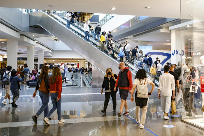 People stroll and go shopping inside the ''Porta di Roma'' shopping mall that opened on the day, as Italy is significantly easing its COVID-19-linked restrictions, in Rome, Italy, 22 May 2021. Shopping centers have so far been closed over the weekend due to coronavirus disease (COVID-19) restrictions. ANSA/FABIO FRUSTACI