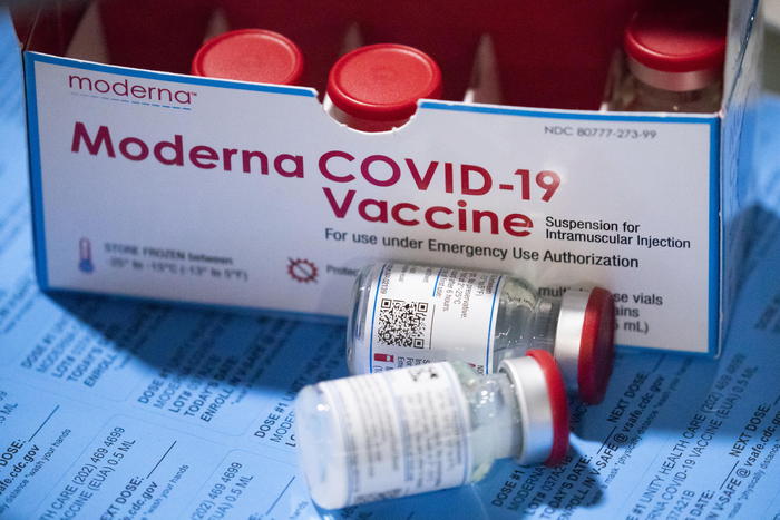 epa09114128 A box of the Moderna COVID-19 vaccine is used at a mass vaccination event hosted by Unity Health Care, at Walter E. Washington Convention Center in Washington, DC, USA, 03 April 2021. About one thousand people were inocculated with the Moderna COVID-19 vaccine at the event. Authorities are encouraging people to continue to use face masks after being vaccinated.  EPA/MICHAEL REYNOLDS