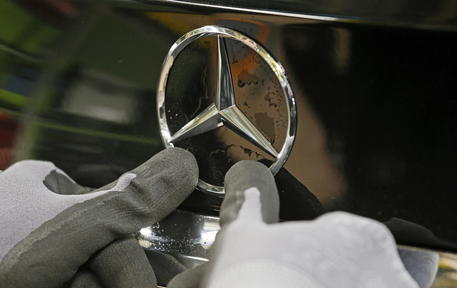 epa08208674 (FILE) - A star of Mercedes Benz at the production of 'A-Class' Mercedes Benz cars at an assembly line at the car manufacturer Daimler in Rastatt, Germany, 04 February 2019 (reissued 10 February 2020). The German business daily newspaper Handelsblat on 10 February 2020 said Daimler AG is to reduce their workforce by 15,000 jobs which is more than what the company had planned. Daimler is to release their 2019 results on 11 February 2020.  EPA/RONALD WITTEK   EDITORIAL USE ONLY *** Local Caption *** 54956884