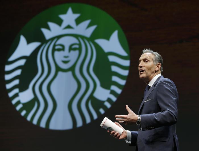 FILE - In this Wednesday, March 23, 2016, file photo, Starbucks CEO Howard Schultz speaks at the coffee company's annual shareholders meeting in Seattle. Starbucks reports financial results Thursday, April 21, 2016. (ANSA/AP Photo/Ted S. Warren, File) [CopyrightNotice: Copyright 2016 The Associated Press. All rights reserved. This material may not be published, broadcast, rewritten or redistributed without permission.]
