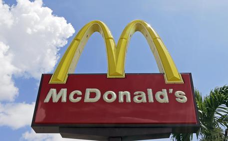 FILE - This Tuesday, June 28, 2016, file photo shows a McDonald's sign at one of the company's restaurants in Miami. On Thursday, March 16, 2017, McDonald's said it has been notified by Twitter that its account was 