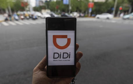 epa09319660 Ride-hailing giant Didi Chuxing mobile application is seen on a smartphone, in Shanghai, China, 03 July 2021. According to the statement by the cybersecurity review office published on 02 July, ChinaÂ’s ride-hailing giant Didi Chuxing Technology Company goes under a cybersecurity review based on the National Security Law and Cybersecurity Law. The investigation started two days after Didi raised 4.4 billion USD in The United StatesÂ’ initial public offering.  EPA/ALEX PLAVEVSKI