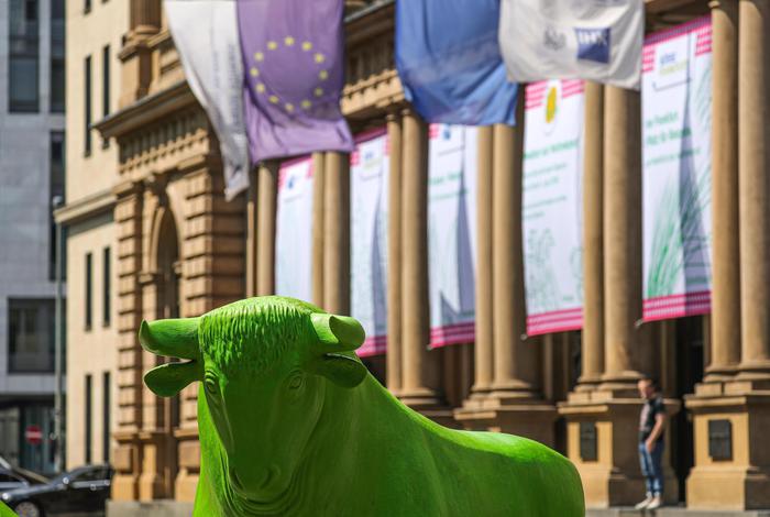 epa07622550 The Bull in front of the Frankfurt Stock Exchange is painted in green color on the occasion of the Green Sauce Day, in Frankfurt am Main, Germany, 03 June 2019. Green Sauce Day will be held on 06 June. Frankfurt am Main is going to attempt a world record with its Green Sauce (Gruene Sosse in German); to enter the Guinness Book 231,775 portions of green sauce must be eaten on 06 June in Frankfurt.  EPA/ARMANDO BABANI