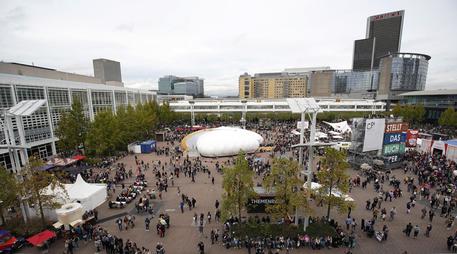 epa07933330 Visitors arrive at the book fair Frankfurter Buchmesse 2019, in Frankfurt am Main, Germany, 19 October 2019. The 71st edition of the international Frankfurt Book Fair, described as the world's most important fair for the print and digital content business, runs from 16 to 20 October and gathers authors, writers and celebrities from all over the world. This year's Guest of Honour country is Norway.  EPA/RONALD WITTEK