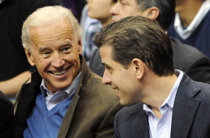 epa07872755 (FILE) - Then US Vice President Joe Biden (L) and his son Hunter Biden attend a college basketball game, at the Verizon Center in Washington, DC, USA, 30 January 2010 (reissued 27 September 2019). An impeachment inquiry against US President Donald J. Trump has been initiated following a whistleblower complaint over his dealings with Ukraine. The whistleblower alleges that Trump had demanded Ukrainian investigations into US Presidential candidate Joe Biden and his son Hunter Biden's business involvement in Ukraine.  EPA/ALEXIS C. GLENN / POOL *** Local Caption *** 02011904