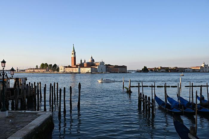View of San Giorgio Maggiore church during the G20 finance ministers and central bankers meeting in Venice, taken on 10 July 2021. - G20 finance ministers gathered on July 9, 2021 in Venice under tight security, with global tax reform at the top of the agenda as the world's biggest economies seek to ensure multinational companies pay their fair share. (Photo by ANDREAS SOLARO / AFP)