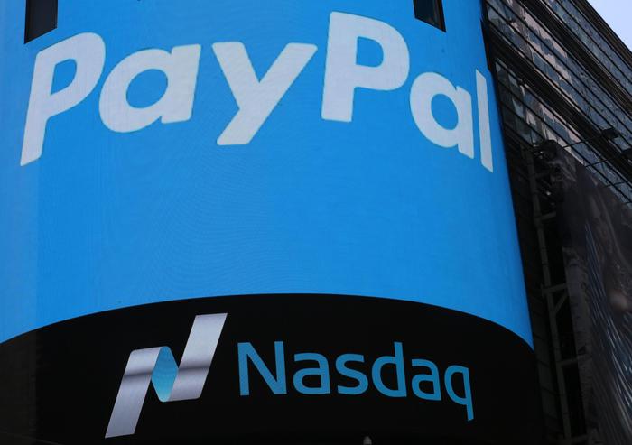 epa06487454 (FILE) - A PayPal logo on the side of the Nasdaq digital board in Times Square in New York, New York, USA, 20 July 2015 (re-issued 31 January 2018). PayPal is to release their 4th quarter 2017 results on 31 January 2018.  EPA/ANDREW GOMBERT