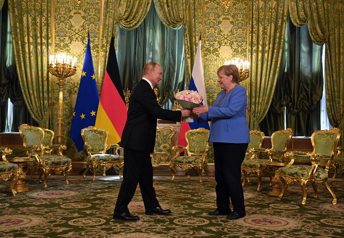 Russian President Vladimir Putin (L) and German Chancellor Angela Merkel (R) during their meeting in the Kremlin in Moscow, Russia, 20 August 2021. German Chancellor  is on a working visit in Moscow. ANSA/SPUTNIK / KREMLIN / POOL MANDATORY CREDIT