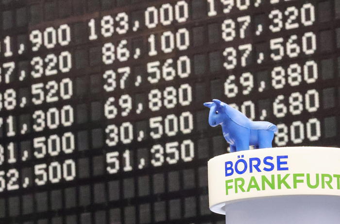 epa08288403 A bull toy stands over a pillar at the Deutsche Boerse stock exchange in Frankfurt am Main, Germany, 12 March 2020. The German stock index DAX dropped below 10,000 points amid the novel coronavirus crisis.  EPA/ARMANDO BABANI