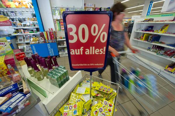 epa04329803 (FILRE) A file photo dated 26 July 2012 showing a woman pushing a shopping cart in a 'Schlecker XL' store in Fellbach, Germany. German consumer confidence is set to climb to a seven-and-a-half year high next month as households in Europe's biggest economy shrug off worries about global tensions in the Middle East and Ukraine, a survey released 25 July 2014 showed. Expectations for rising wages will help to drive consumer confidence to a higher-than-forecast 9 points in August from a July reading of 8.9 points, the Nuremberg-based GfK research group said in releasing its forward-looking indicator. Analysts had expected the GfK indicator would hold steady at the July level. 'Despite the escalation in the situations in Israel and Ukraine, German consumers continue to be exceedingly optimistic this summer,' the GfK said.
Based on a survey of about 2,000 households, the August reading represents the indicator's highest level since December 2006.  EPA/MARIJAN MURAT