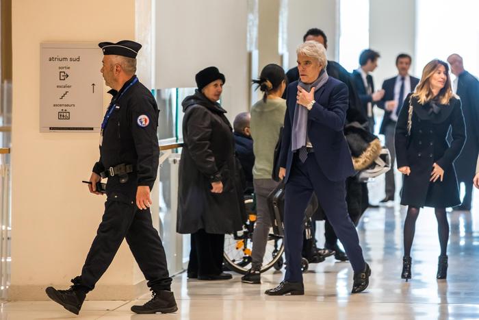 epa07484444 French tycoon Bernard Tapie (C), arrives at the Tribunal de Paris courthouse for the last day of his trial, in Paris, France, 04 April 2019. French businessman Bernard Tapie goes on trial over a compensation of 404 million euros in 2008, to settle a long-running legal dispute following a fraught 1993 corporate deal regarding the sale of his sportswear company Adidas. The case involves Christine Lagarde, now head of the International Monetary Fund (IMF) but at the time Finance minister of Nicolas Sarkozy's government, and her former chief of staff, Stephane Richard, now chief executive of Orange, among others.  EPA/CHRISTOPHE PETIT TESSON