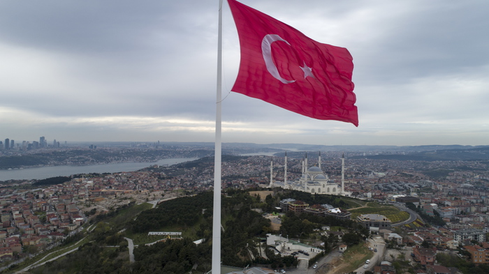 epa09155224 An aerial picture taken with a drone shows a huge Turkish flag fluttering at the Camlica Hill in Istanbul, Turkey, 23 April 2021. A 111-meter-long (364 feet) and 1,000-square-meter (107,639-square-foot) wide Turkey's tallest flag was inaugurated on Istanbulâ€™s CamlÄ±ca Hill as Turkish President Recep Tayyip Erdogan attended with a group of children during the occasion of National Sovereignty and Childrenâ€™s Day.  EPA/ERDEM SAHIN
