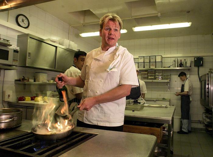 LON01 - 20010119 - LONDON, UNITED KINGDOM : British Chef Gordon Ramsey shouts instructions from his kitchen at his Chelsea restaurant 19 January 2001, after being awarded three stars in France's gastronomy bible, Michelin. Ramsey is only the second British chef to be awarded three stars in the Michelin. 
EPA PHOTO EPA/GERRY PENNY