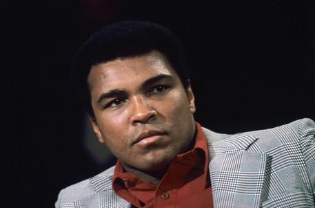 epa05345155 (FILE) A file photo dated 10 November 1975 of US boxer Muhammad Ali as a guest of the German ZDF television sport show 'Aktuelles Sportstudio' in Wiesbaden, Germany. Born as Cassius Clay, boxing legend Muhammad Ali, dubbed as 'The Greatest,' died on 03 June 2016 in Phoenix, Arizona, USA, at the age of 74, a family spokesman said.  EPA/MANFRED REHM